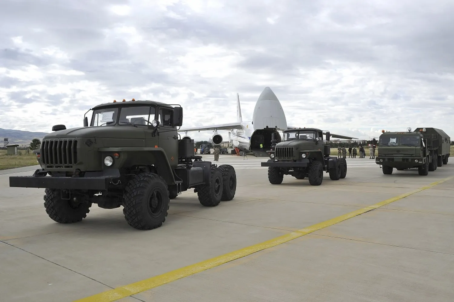 Military vehicles and equipment, parts of the S-400 defense systems, are seen on the tarmac, after they were unloaded at Murted military airport in Ankara, Turkey, July 12, 2019. (AP)