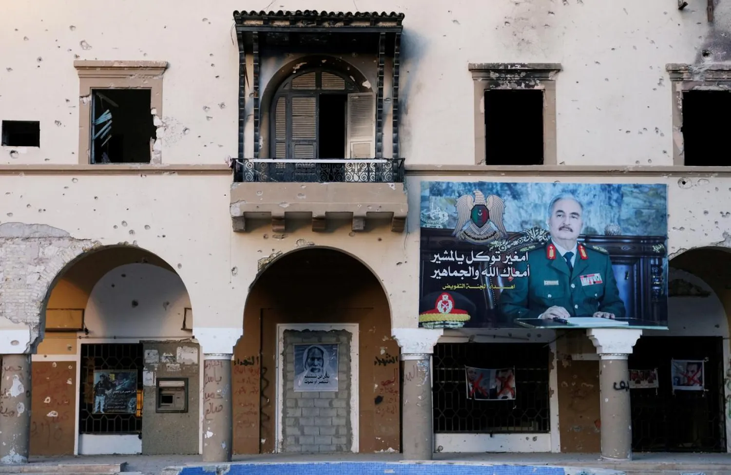 A poster of LNA commander Khalifa Haftar on a building in Benghazi, Libya February 21, 2019. (Reuters)