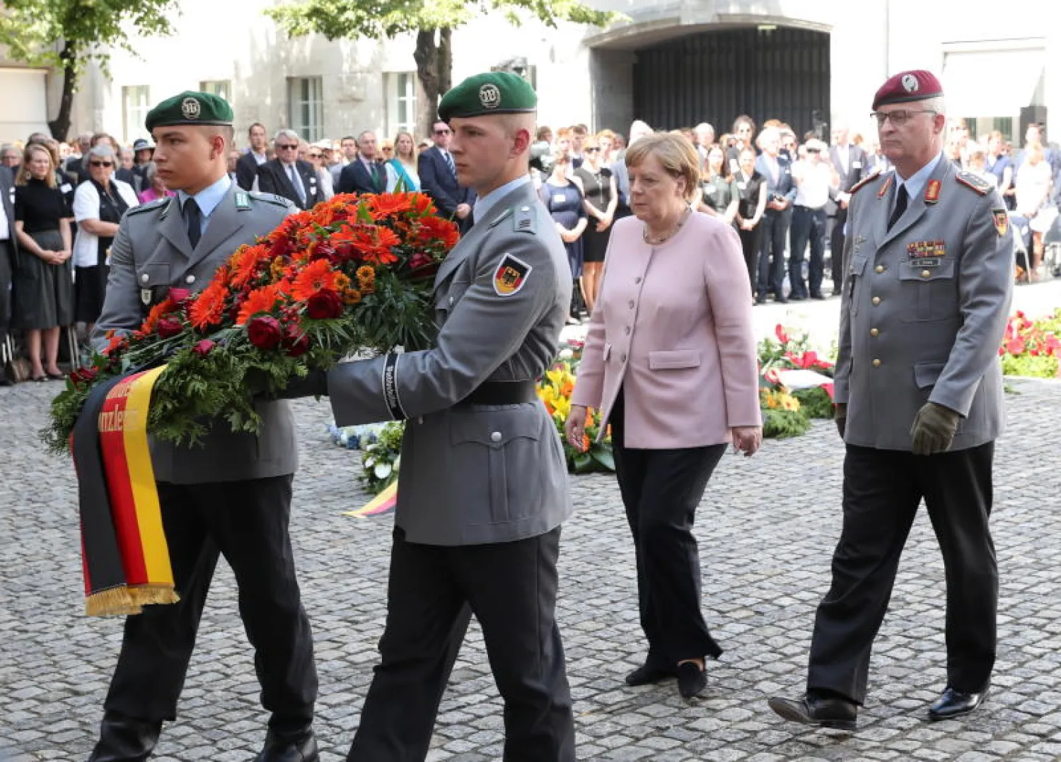 المستشارة الألمانية أنجيلا ميركل في احتفال برلين (إ.ب.أ)