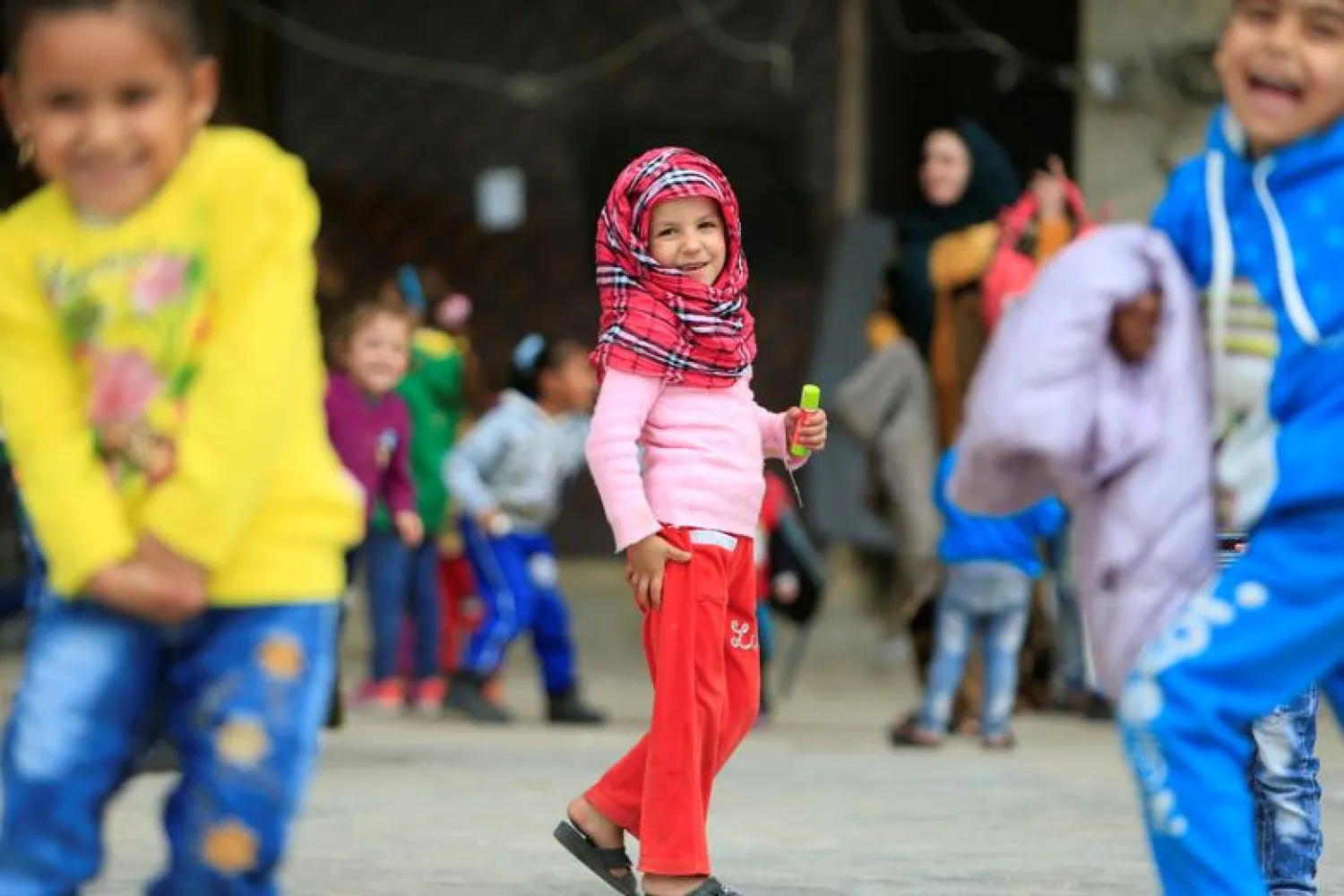 Syrian children play at a compound housing Syrian refugees in Sidon, southern Lebanon January 25, 2017. REUTERS/Ali Hashisho