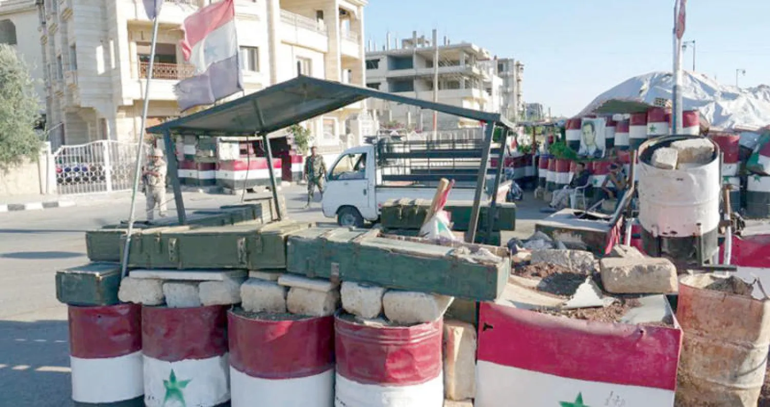 نقطة تفتيش في مدينة درعا جنوب سوريا عام 2018 (إب)