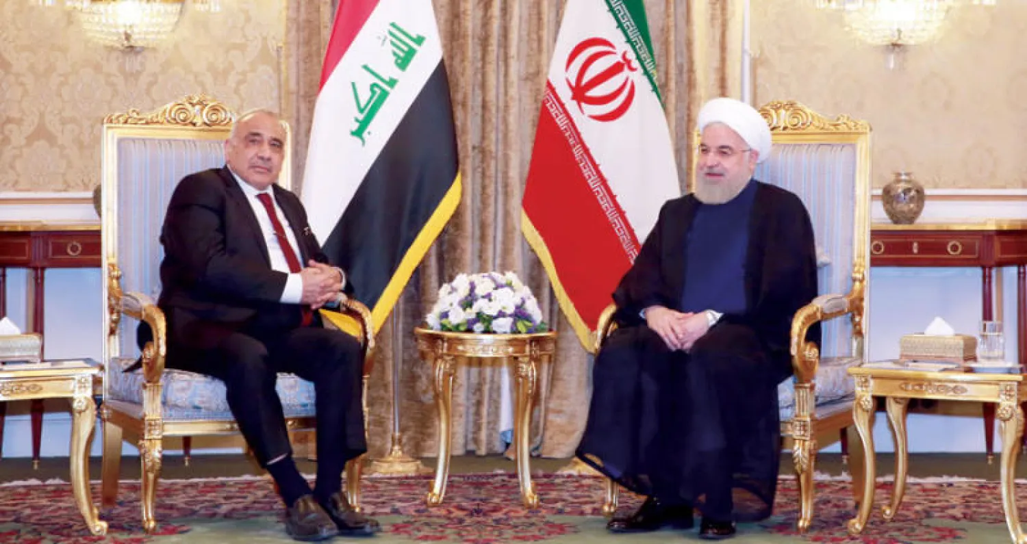 روحاني مستقبلاً عبد المهدي في طهران أمس (أ.ف.ب)