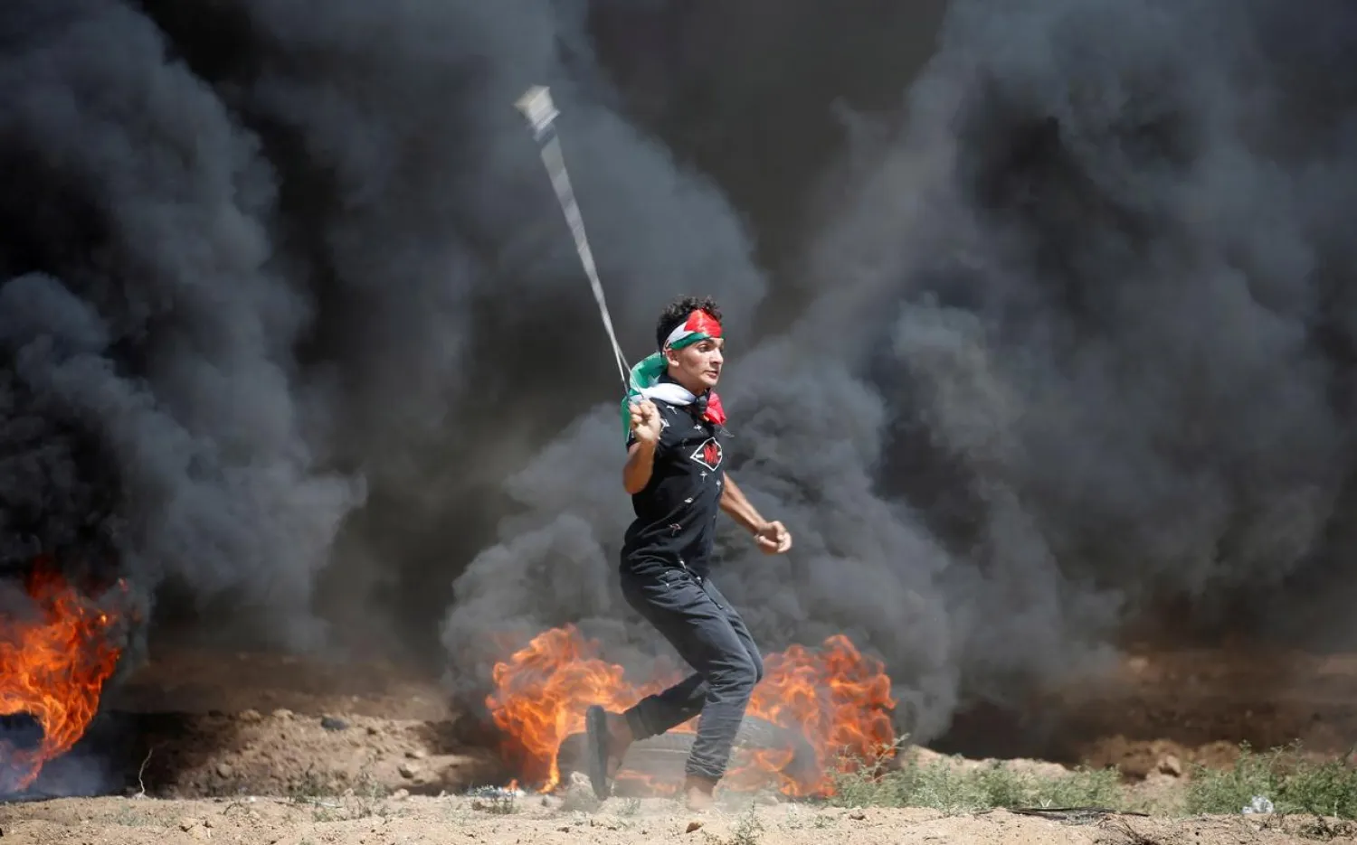 A Palestinian demonstrator during a protest marking al-Quds Day, (Jerusalem Day), at the Israel-Gaza border (File Photo: Reuters)
