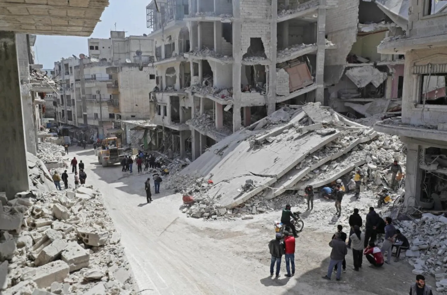 Syrian White Helmets search rubble of collapsed buildings for survivors in Idlib. AFP file photo