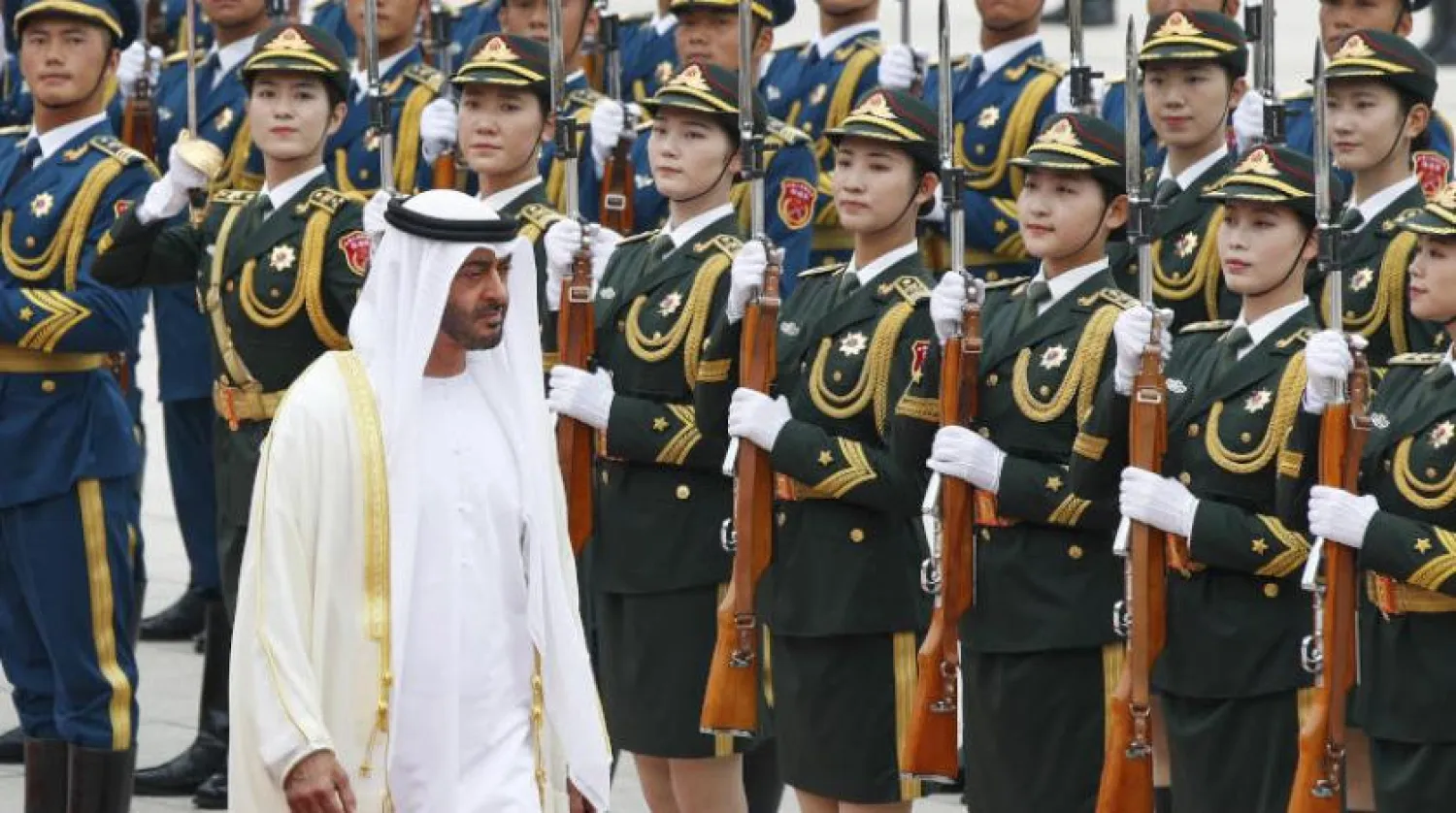 Abu Dhabi's Crown Prince, Sheikh Mohammed bin Zayed Al Nahyan, reviews an honor guard with Chinese President Xi Jinping during a welcome ceremony at the Great Hall of the People in Beijing, Monday, July 22, 2019. (AP Photo/Andy Wong)