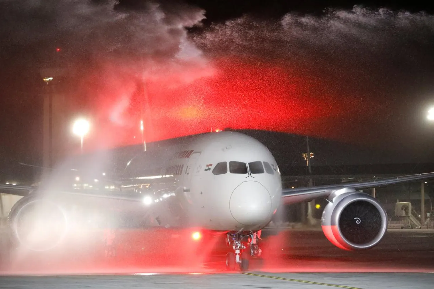 An Air India Boeing 787-8 Dreamliner plane receives a water cannon statue upon its landing at Ben Gurion International Airport in Lod, near Tel Aviv, Israel, March 22, 2018. REUTERS/Amir Cohen