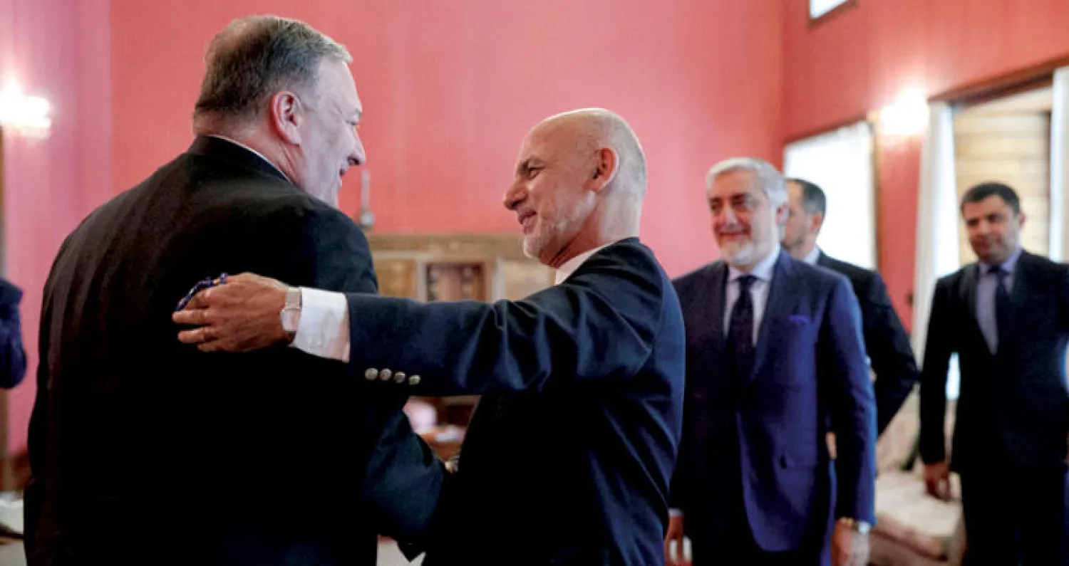 صورة أرشيفية للرئيس غني لدى استقباله بومبيو في كابل قبل شهر (رويترز)