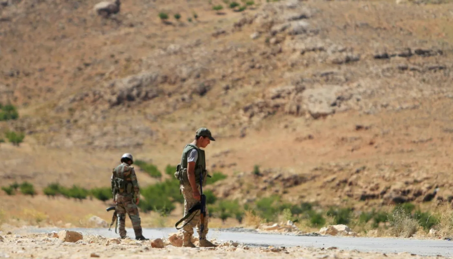 Hezbollah fighters are seen in Jroud Arsal, near Syria-Lebanon border, August 12, 2017. REUTERS/Ali Hashisho