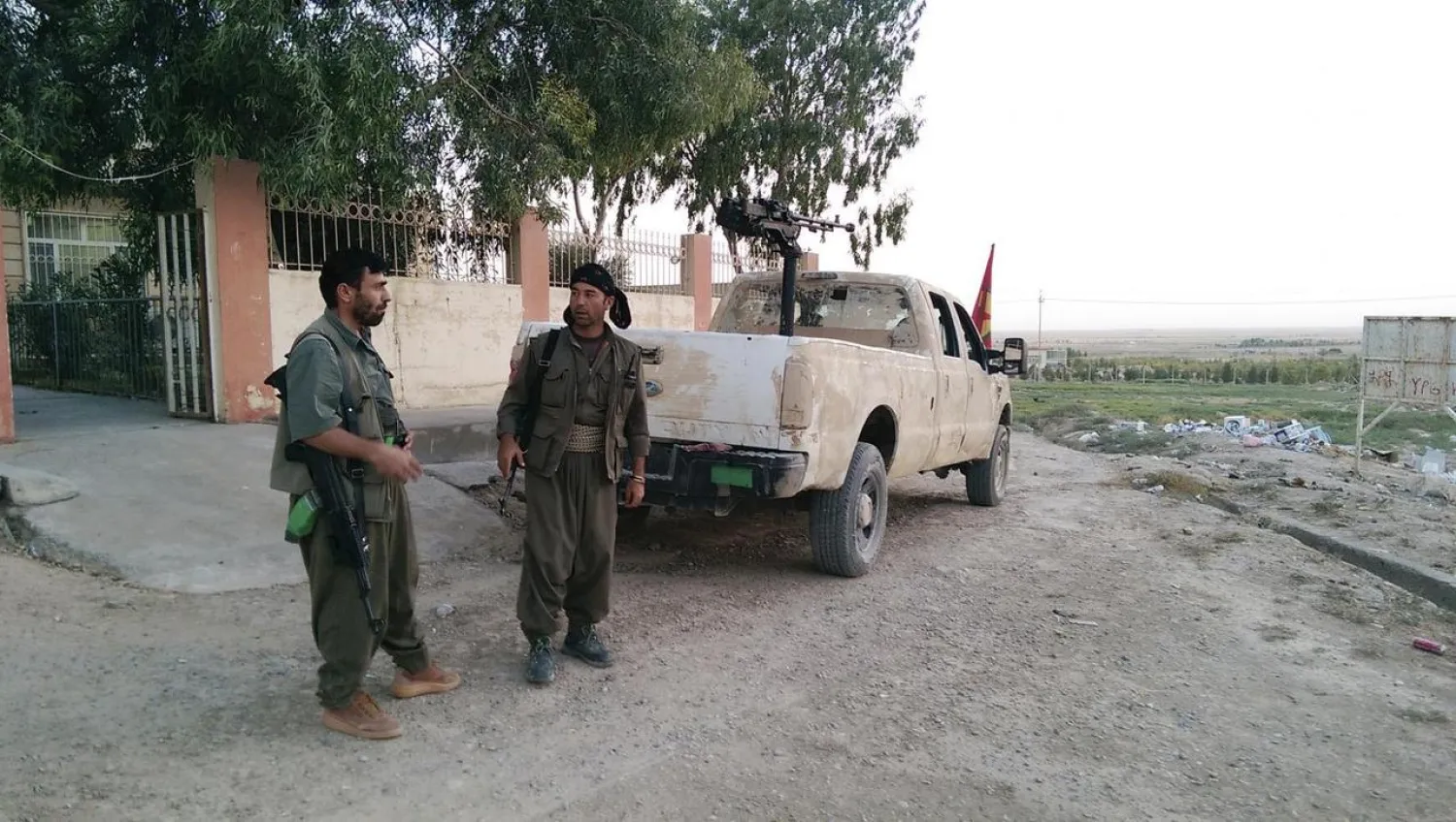 Kurdistan Workers Party (PKK) fighters participate in an intensive security deployment against ISIS militants in the town of Makhmur, southwest of the Kurdish city of Arbil, August 17, 2014. REUTERS/Stringer