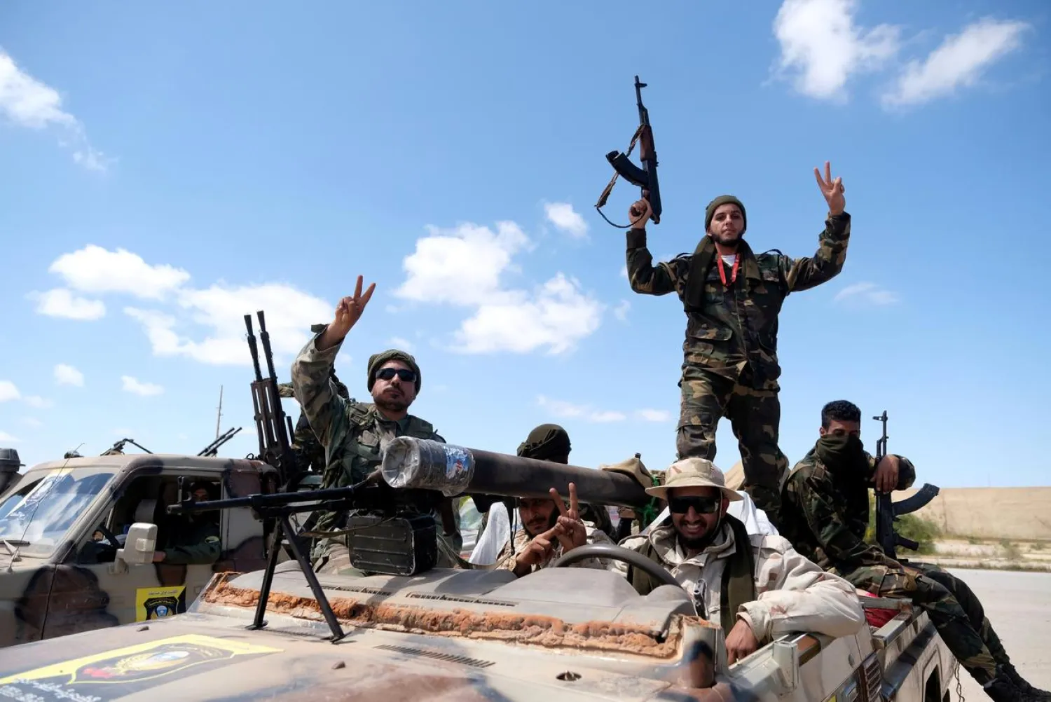 Libyan National Army (LNA) members head out of Benghazi to reinforce troops advancing towards Tripoli, in Benghazi, Libya, April 7, 2019. REUTERS/Esam Omran Al-Fetori/File Photo