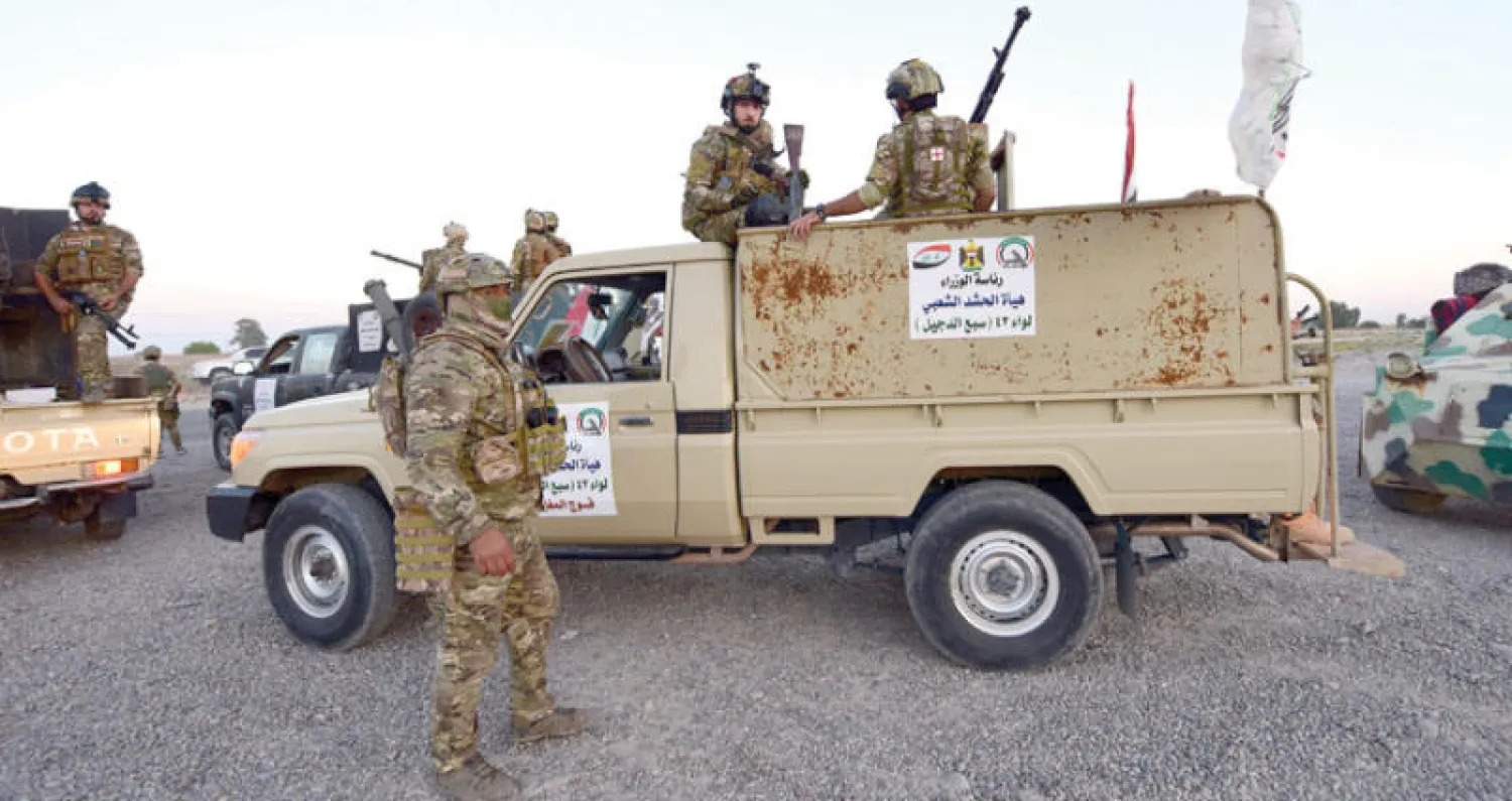 مسلحون من «الحشد الشعبي» في العراق (إ.ب.أ)