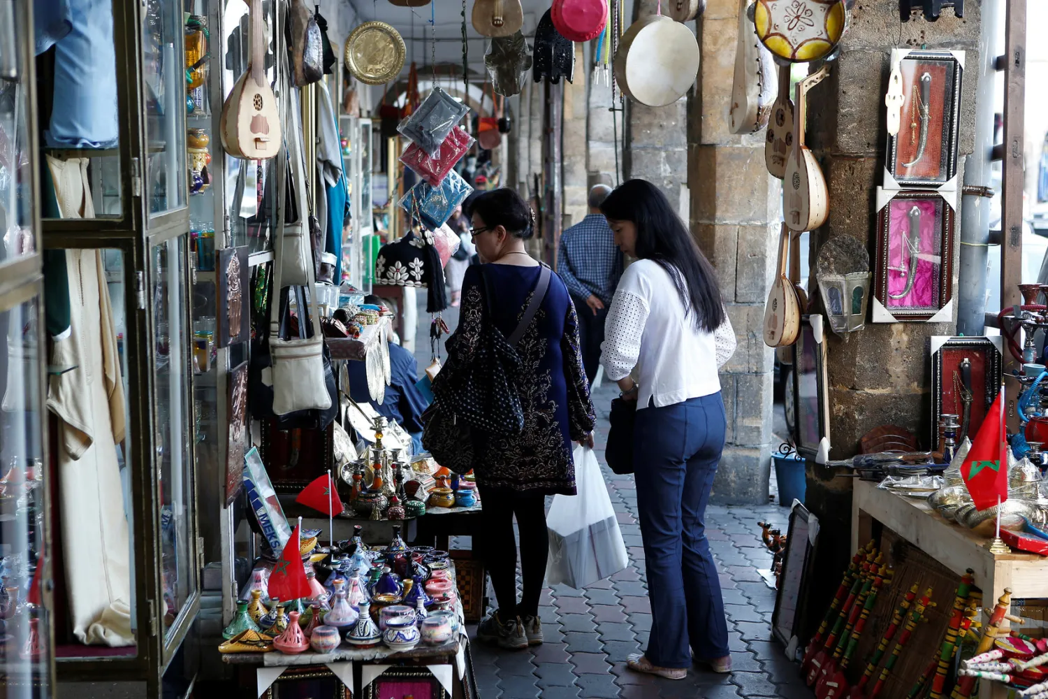 Chinese tourists browse at a shopping area in Casablanca in 2016. Youssef Boudlal/Reuters