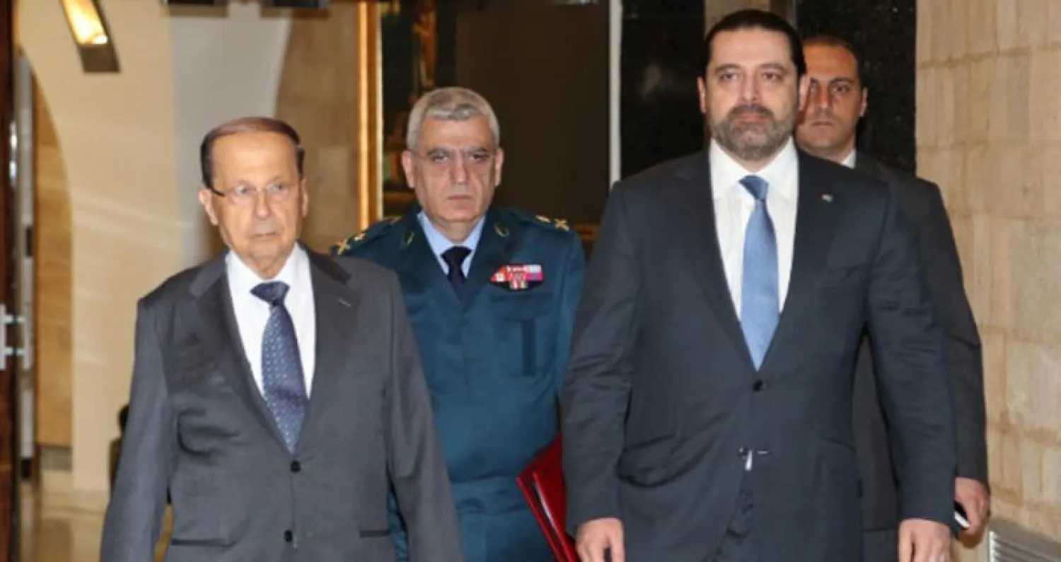 رئيسي الجمهورية ميشال عون(يسار)، والحكومة سعد الحريري.
