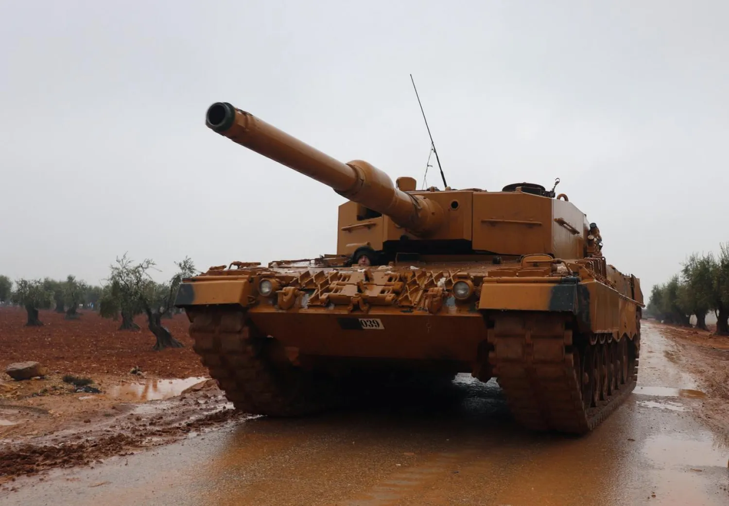 A Turkish military tank is seen near Mount Barsaya, northeast of Afrin, Syria January 23, 2018. (Reuters)
