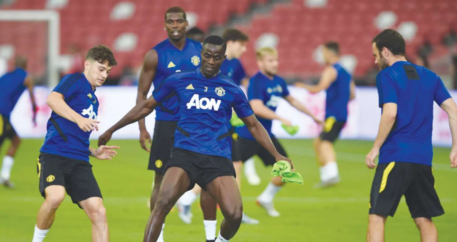 لاعبو يونايتد خاضوا فترة إعداد جيدة في آسيا  قبل انطلاق الموسم الجديد (أ.ف.ب)