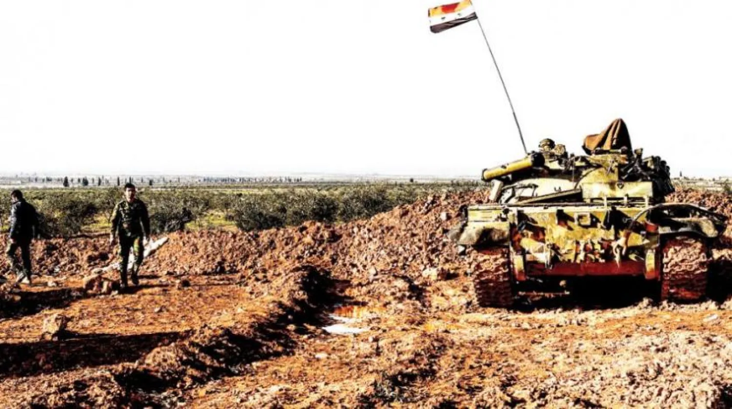 A Syrian regime forces’ tank is seen at a position in the village of Qart Saghir northwest of the northern town of Manbij. GEORGE OURFALIAN/AFP
