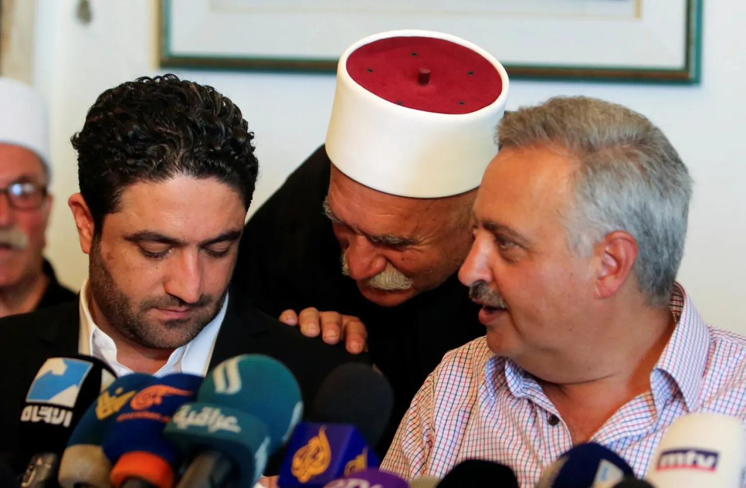 Minister Saleh al-Gharib (L), whose two bodyguards were killed in the Qabr Shmoun attack, sits with ally MP Talal Arslan, during a news conference in Khaldeh, Lebanon July 1, 2019. (Reuters)