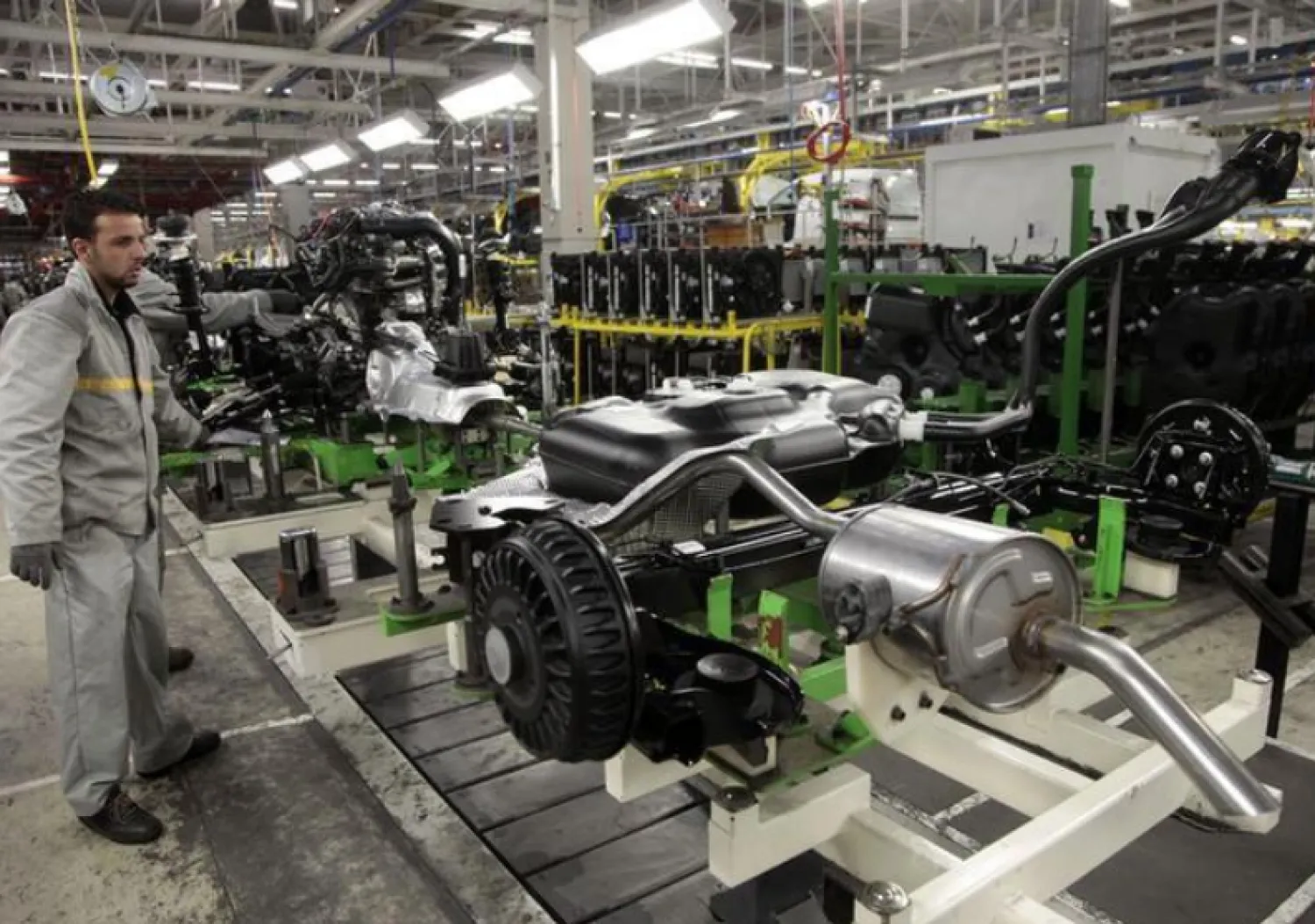 Employees work at a factory operated by Somaca in Tangiers, file. REUTERS/Stringer 
