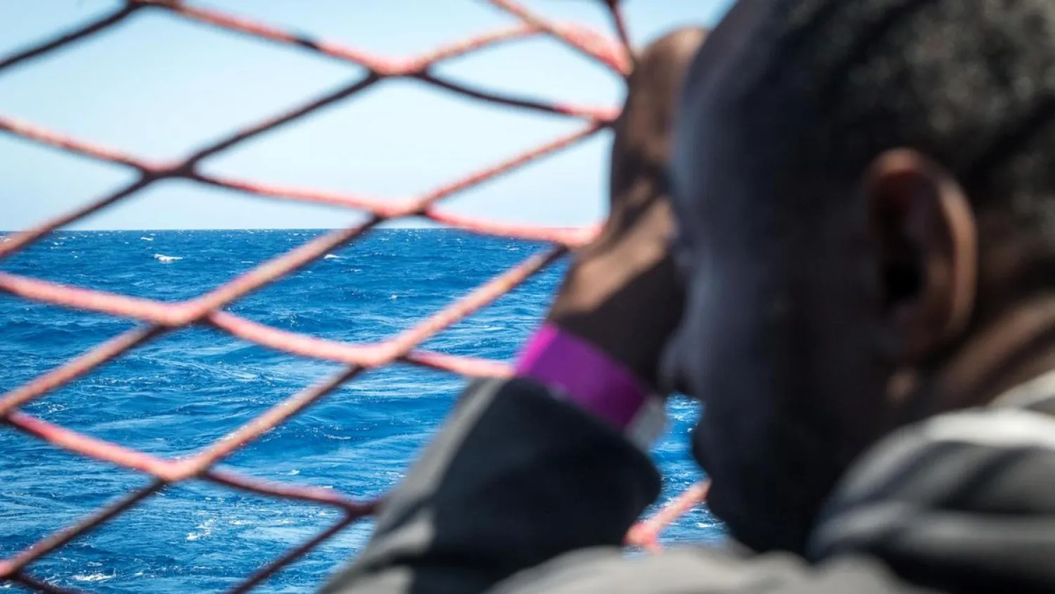 A migrant looks out at the Mediterranean from a rescue ship. Reuters file photo