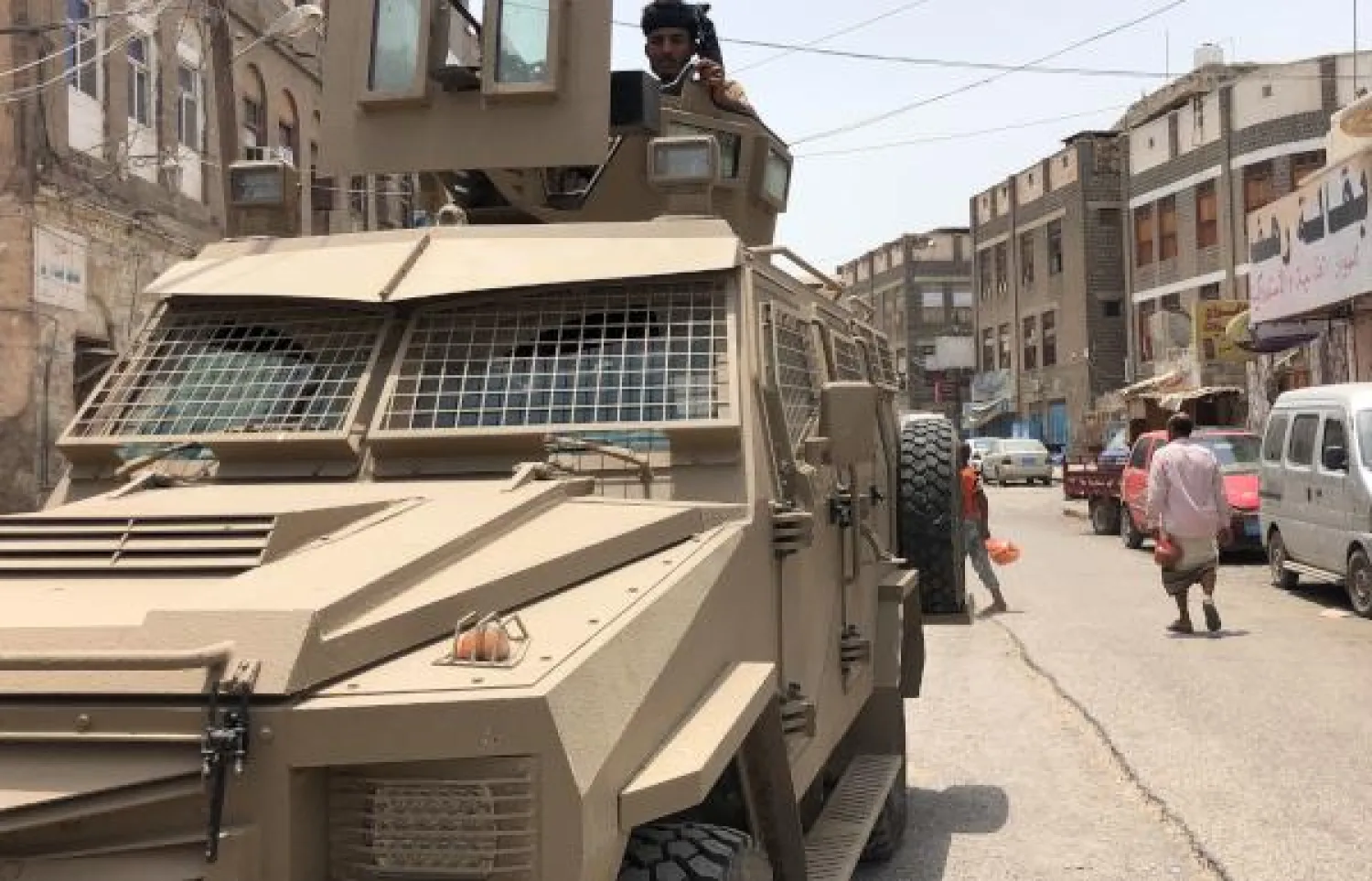 A member of the southern separatist movement rides an armoured military vehicle in Yemen's government-held second city Aden on August 11, 2019, following clashes between pro-government forces and separatists. - AFP photo