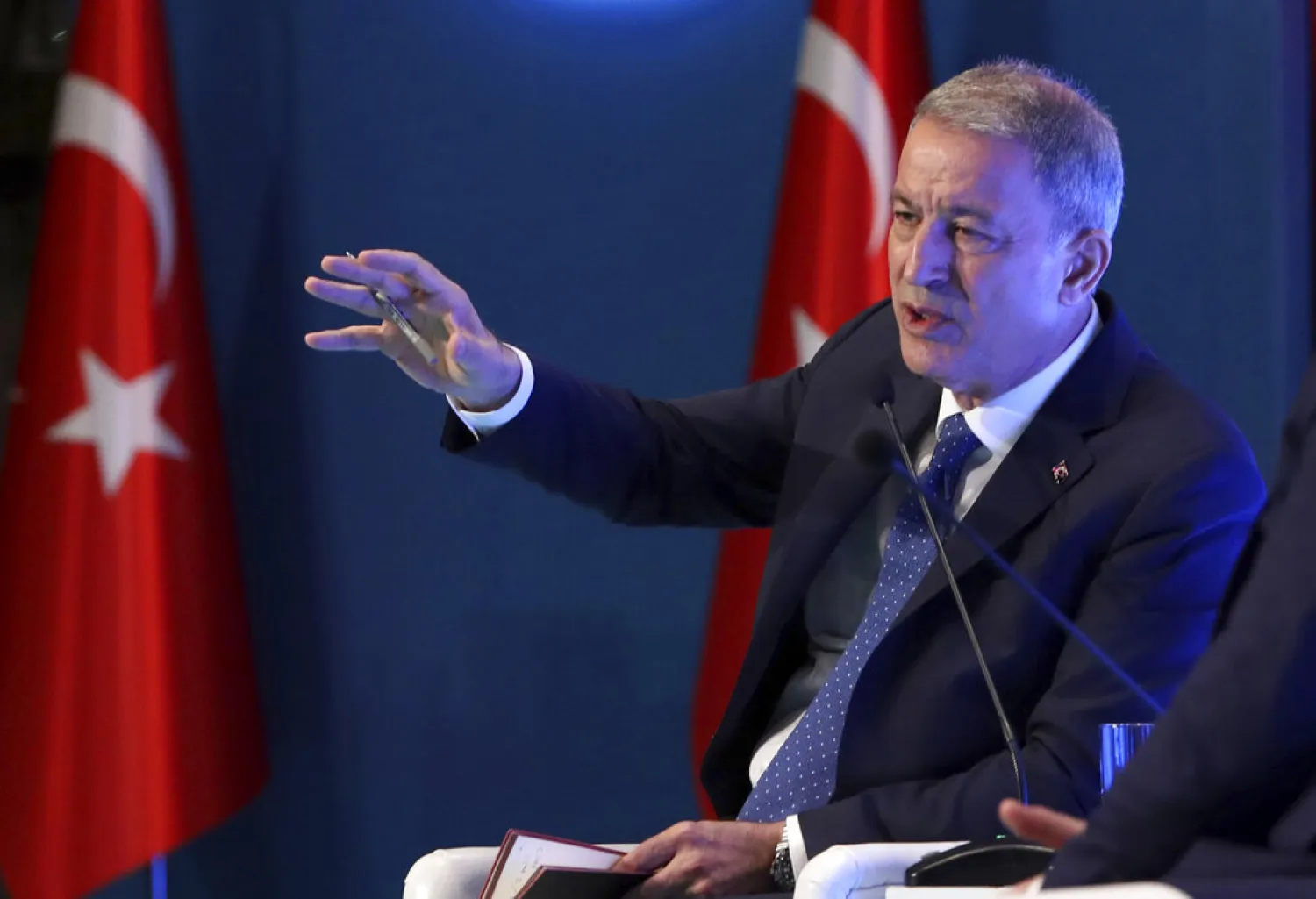  Turkish Defense Minister Hulusi Akar addresses a meeting of his country's ambassadors, in Ankara, Turkey, Wednesday, Aug. 7, 2019. (Turkish Defence Ministry via AP, Pool)