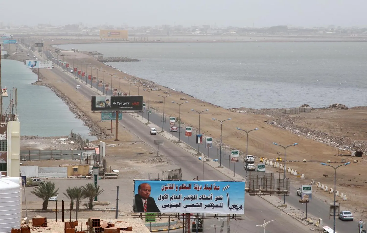 Cars drive on a road linking two neighborhoods of Aden, Yemen August 10, 2019. (Reuters)