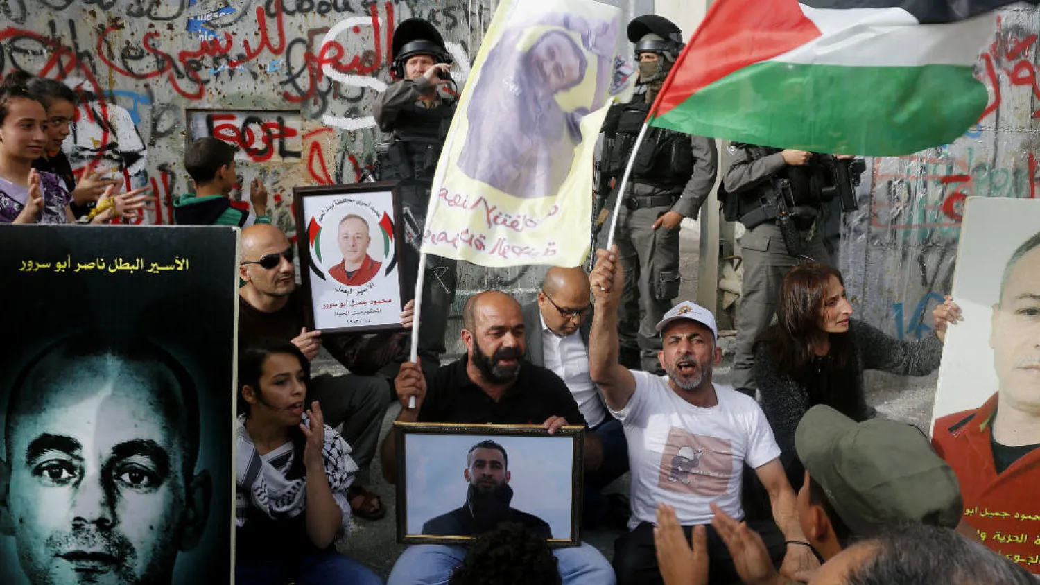 Palestinians demonstrate on April 26 in solidarity with Palestinians imprisoned in Israeli jails after hundreds of detainees launched a hunger strike. (AFP)