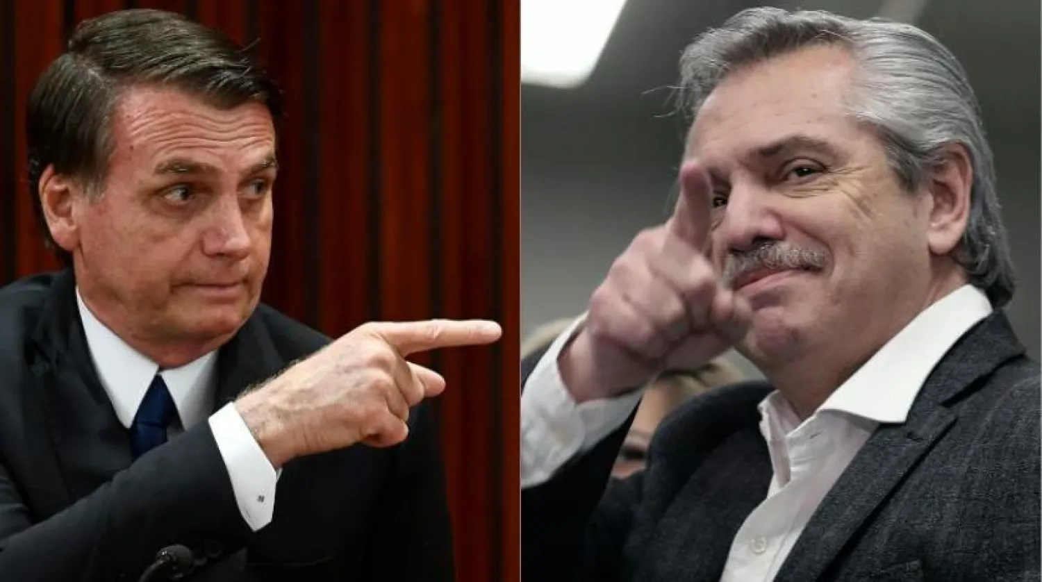 Arjantin devlet başkanlığı seçimlerindeki solcu aday Alberto Fernandez ve Brezilya Devlet Başkanı Jair Bolsonaro (AFP)
