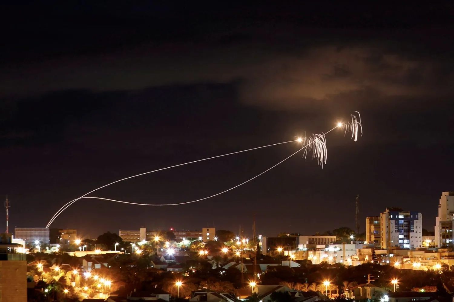 Iron Dome anti-missile system fires interception missiles as rockets are launched from Gaza towards Israel as seen from the city of Ashkelon, Israel October 27, 2018. (Reuters)