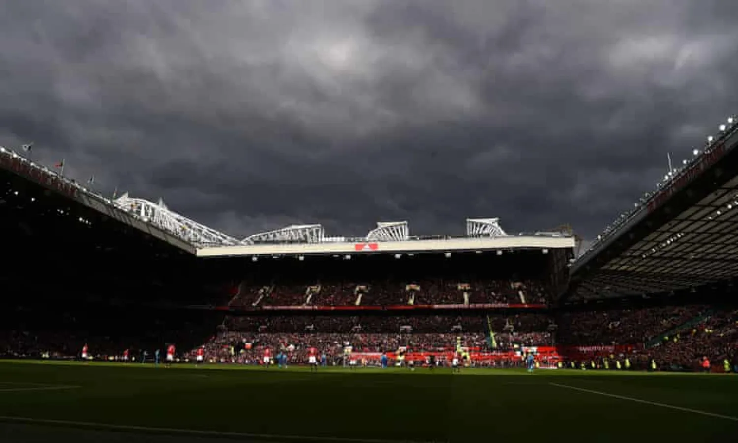 Dark clouds over Old Trafford before the game against Arsenal in April 2018. Manchester United finished 32 points behind City last season. Photograph: Paul Ellis/AFP/Getty Images