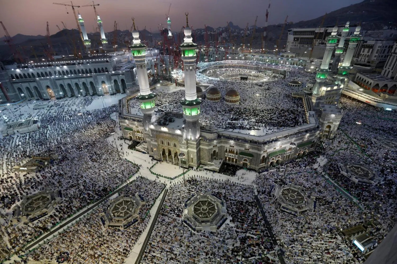 FILE PHOTO: Muslim pilgrims pray around the holy Kaaba at the Grand Mosque, during the annual hajj pilgrimage in Mecca September 27, 2014. REUTERS/Muhammad Hamed/File Photo
