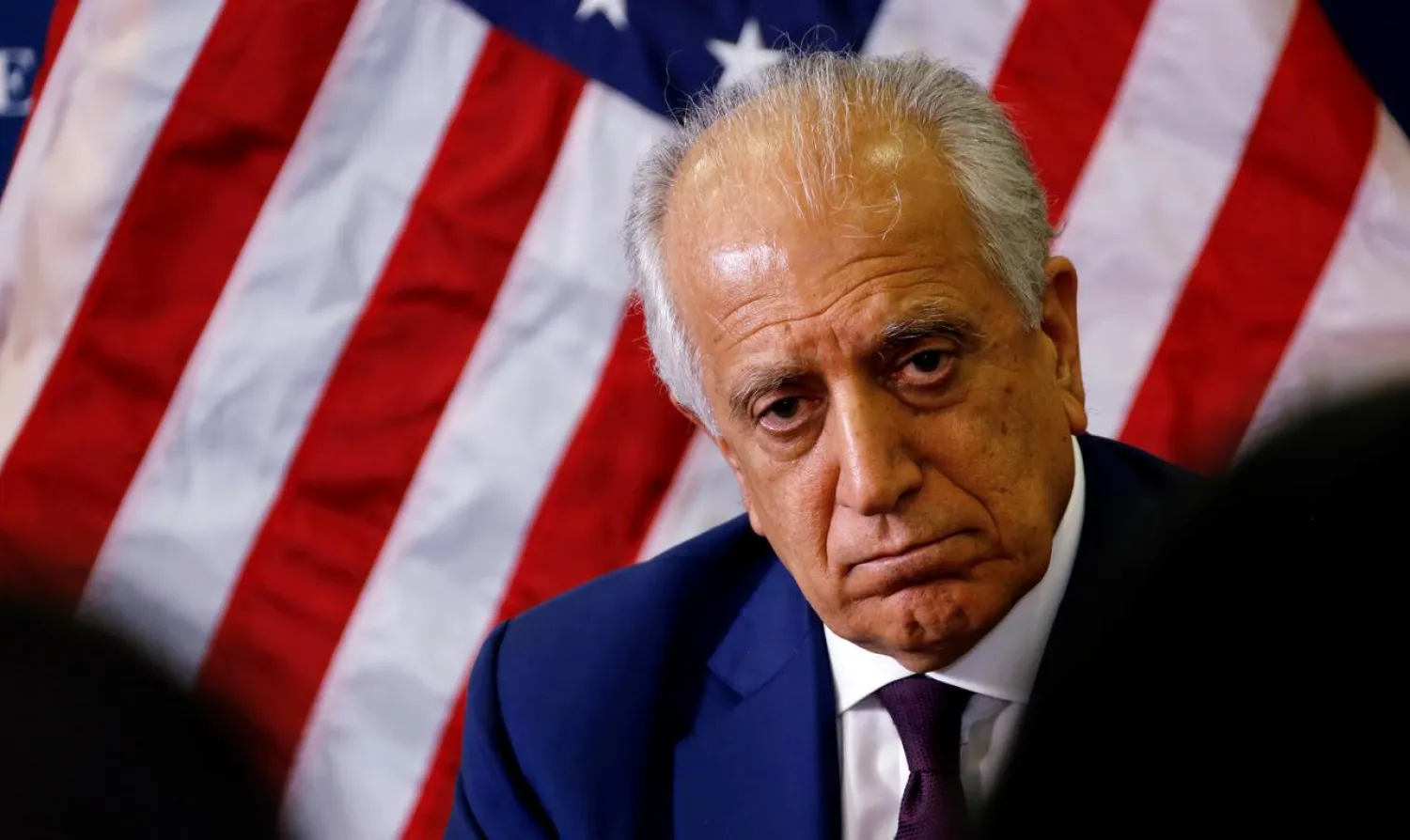 FILE PHOTO: US special envoy for peace in Afghanistan, Zalmay Khalilzad, talks with local reporters at the US embassy in Kabul, Afghanistan November 18, 2018. US embassy/Handout via Reuters