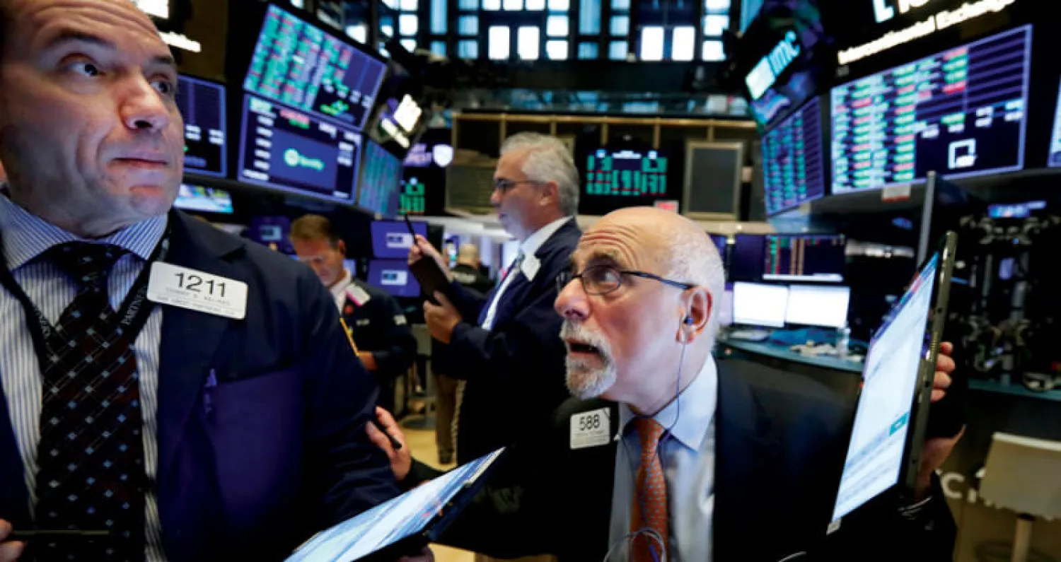 على عكس المتوقع ارتفعت وول ستريت أمس رغم تحذيرات قوية من دخول الاقتصاد الأميركي مرحلة ركود (أ.ب)