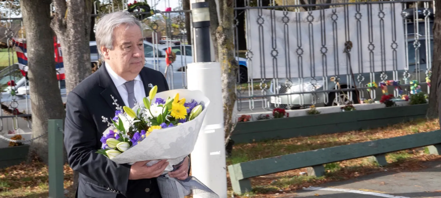The UN Secretary-General, António Guterres, lays a wreath in Christchurch memory of the victims of a mass shooting in the New Zealand city in March 2019, May 2019 | UN Photo/Mark Garten