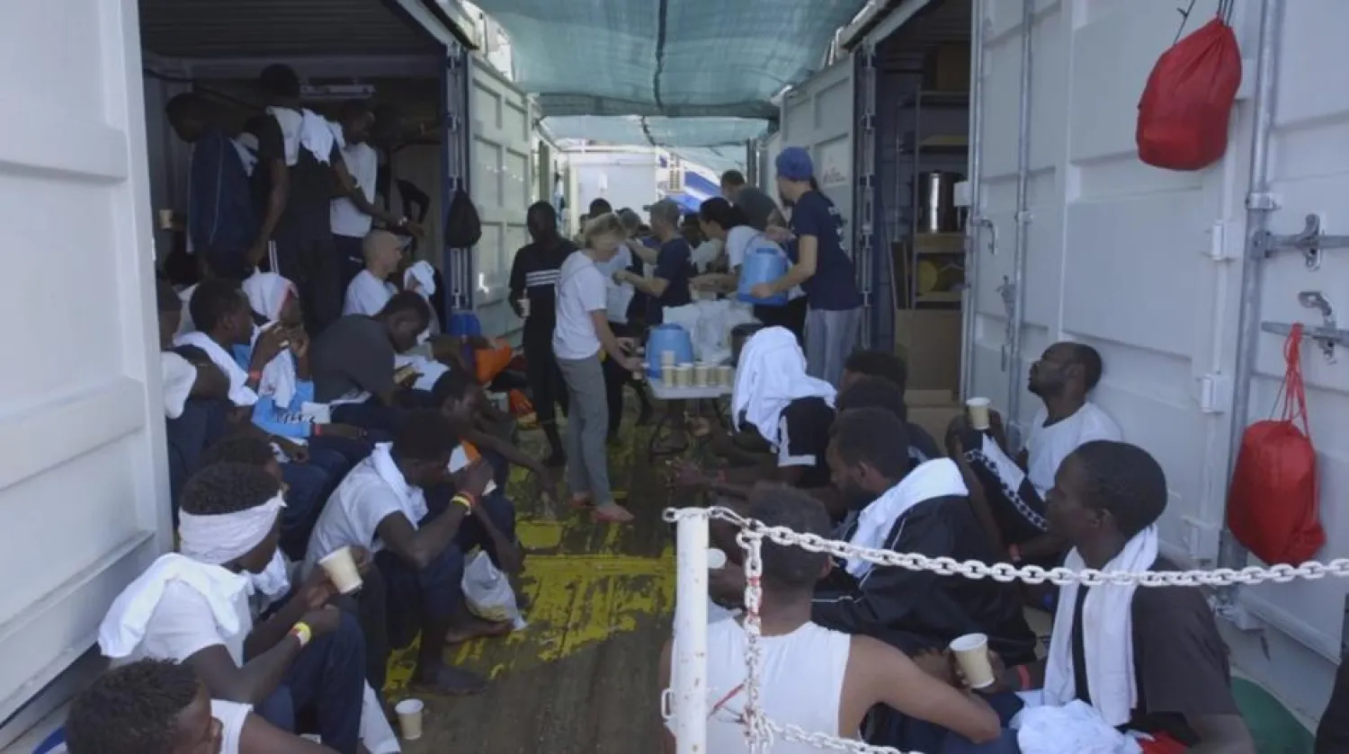 Rescued migrants rest aboard the Ocean Viking ship at the Mediterranean Sea, August 21, 2019 in this still image taken from a social media video. MSF via REUTERS