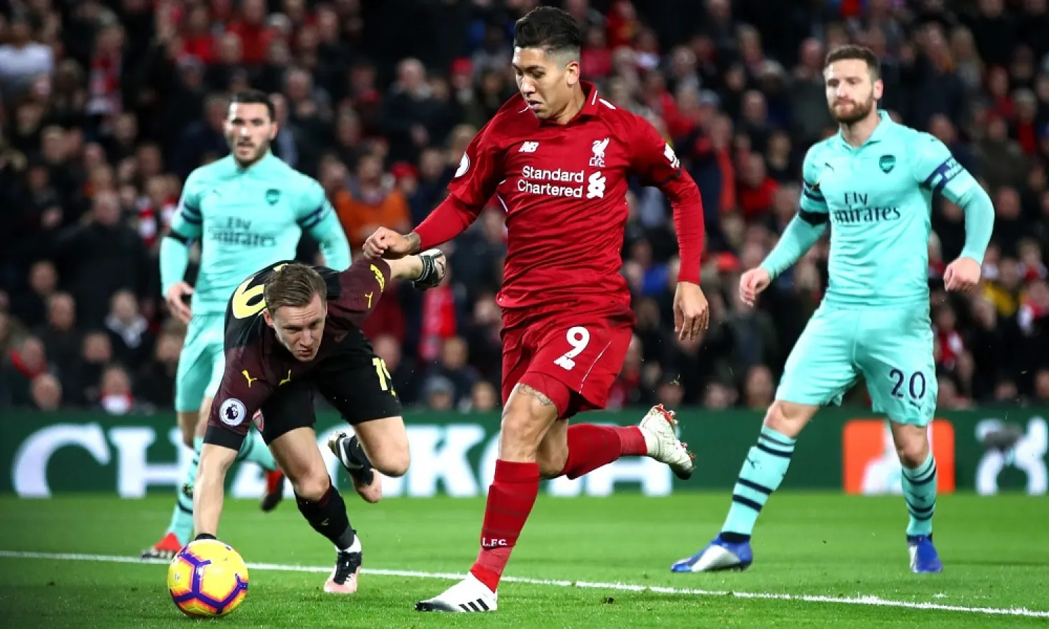 Roberto Firmino scores the first goal of his hat-trick in Liverpool’s 5-1 thrashing of Arsenal at Anfield last season. (Getty Images)