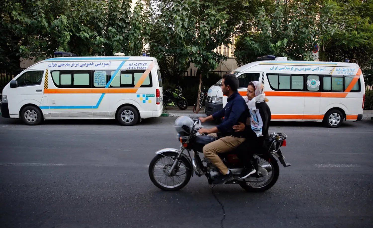 Private ambulances in Tehran.Credit: Abedin Taherkenareh/EPA