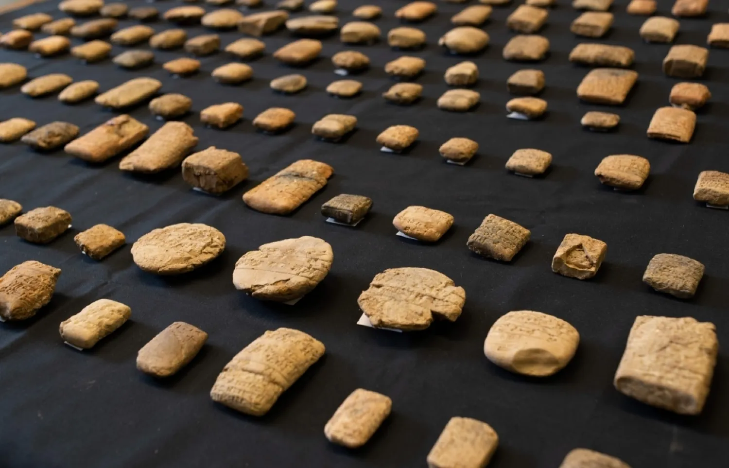 The cuneiform tablets, returned by the British Museum to Iraq, are mostly economic documents but also include letters, legal and school texts and a mathematical document. (AFP)
