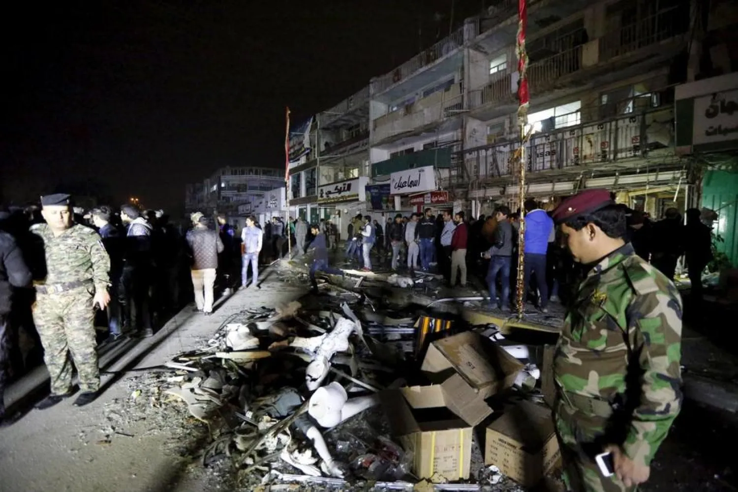 Iraqi security forces gather at the site of a car bomb in New Baghdad, (File photo: Reuters)
