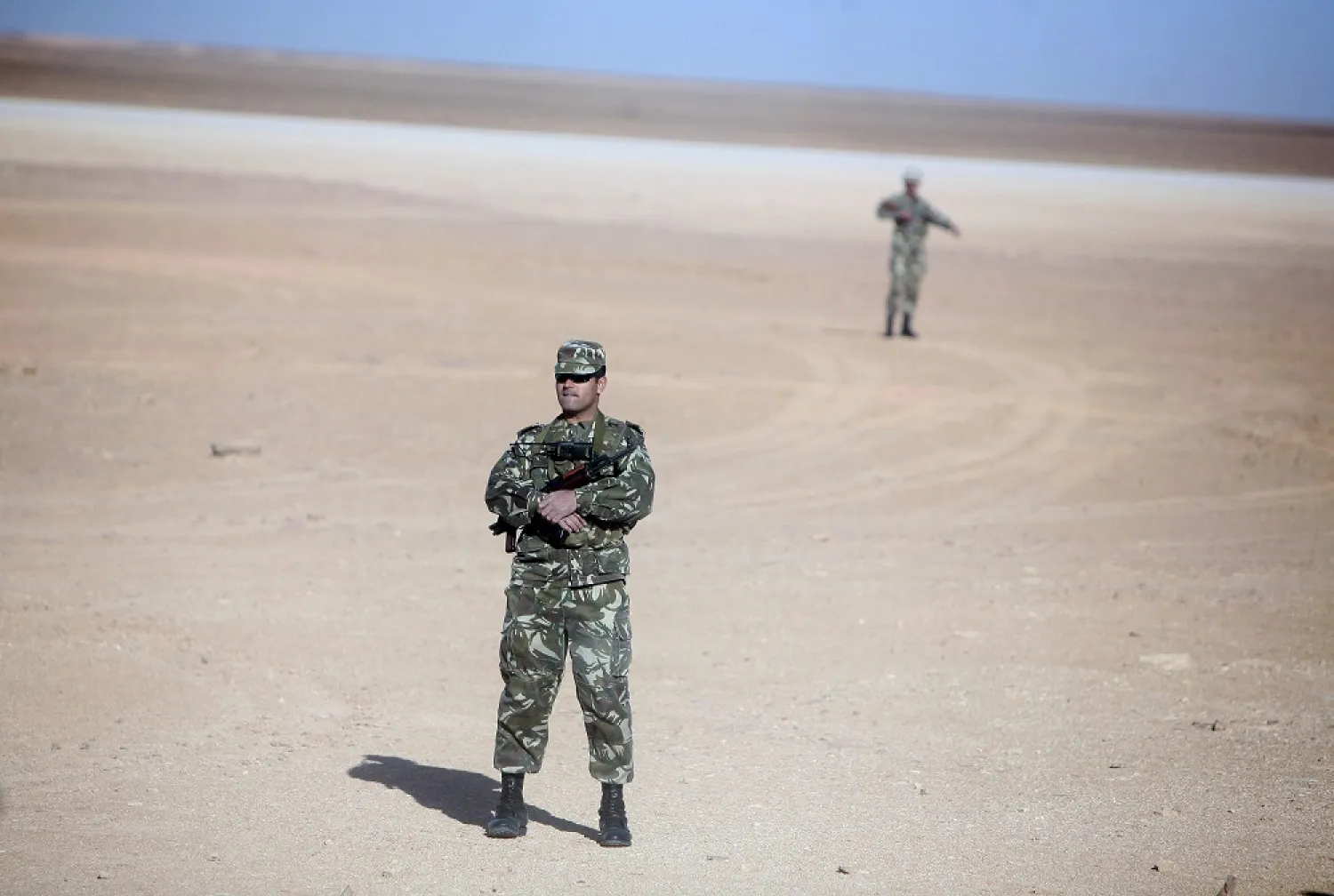 Soldiers stand guard at a Krechba gas treatment plant in Algieria. (Reuters)