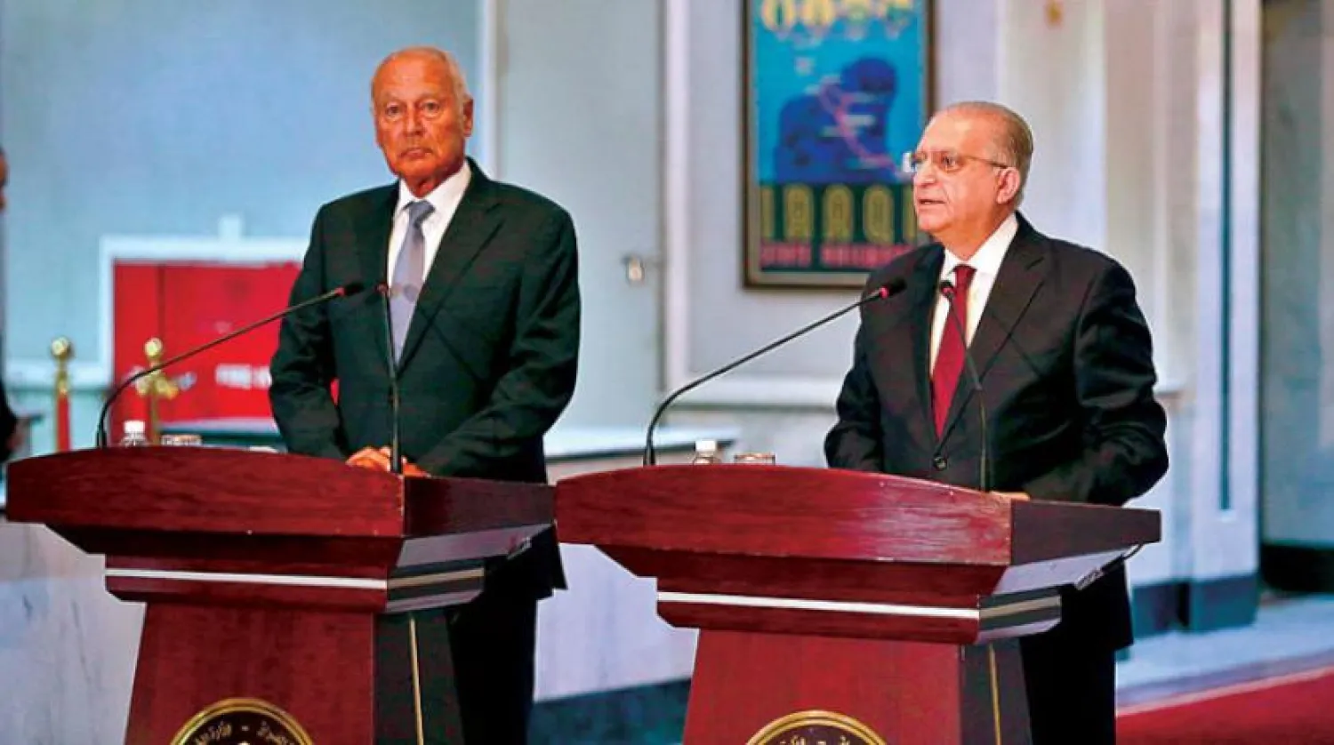 A joint press conference between Iraqi Foreign Minister Mohammed al-Hakim and Arab League Secretary General Ahmed Aboul Gheit in Baghdad on Tuesday, September 3, 2019 (AP)