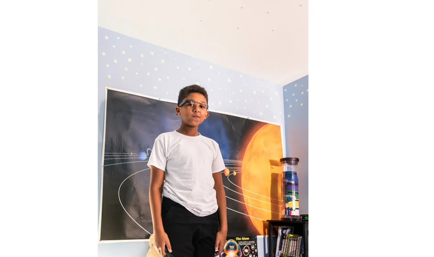 Esaïe Prickett wearing Google Glass at home in Morgan Hill, Calif. He and his family tested the device in a clinical trial.CreditCreditCayce Clifford for The New York Times