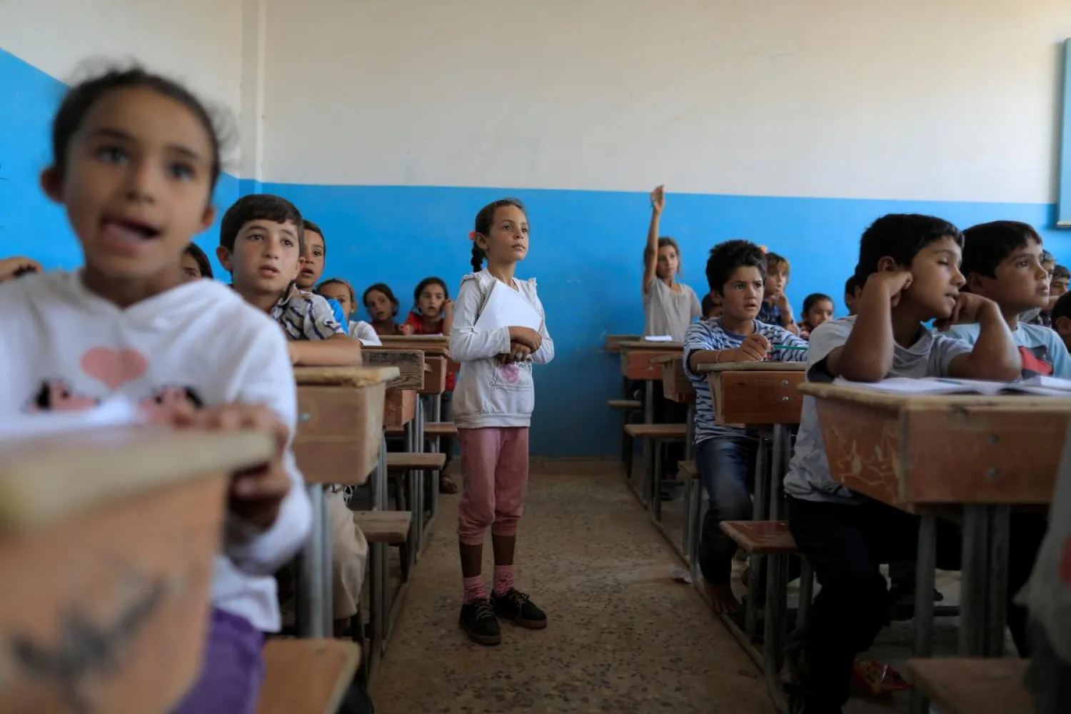 Children attend their first class after they got registered at the school in Hazema North Raqqa, Syria August 21, 2017.Picture taken August 21, 2017. REUTERS/Zohra Bensemra