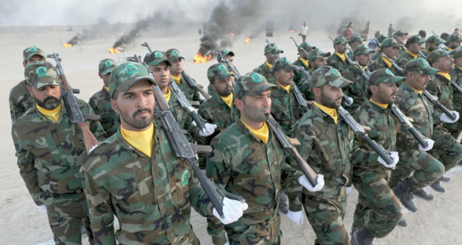 عناصر من الحشد الشعبي (رويترز)