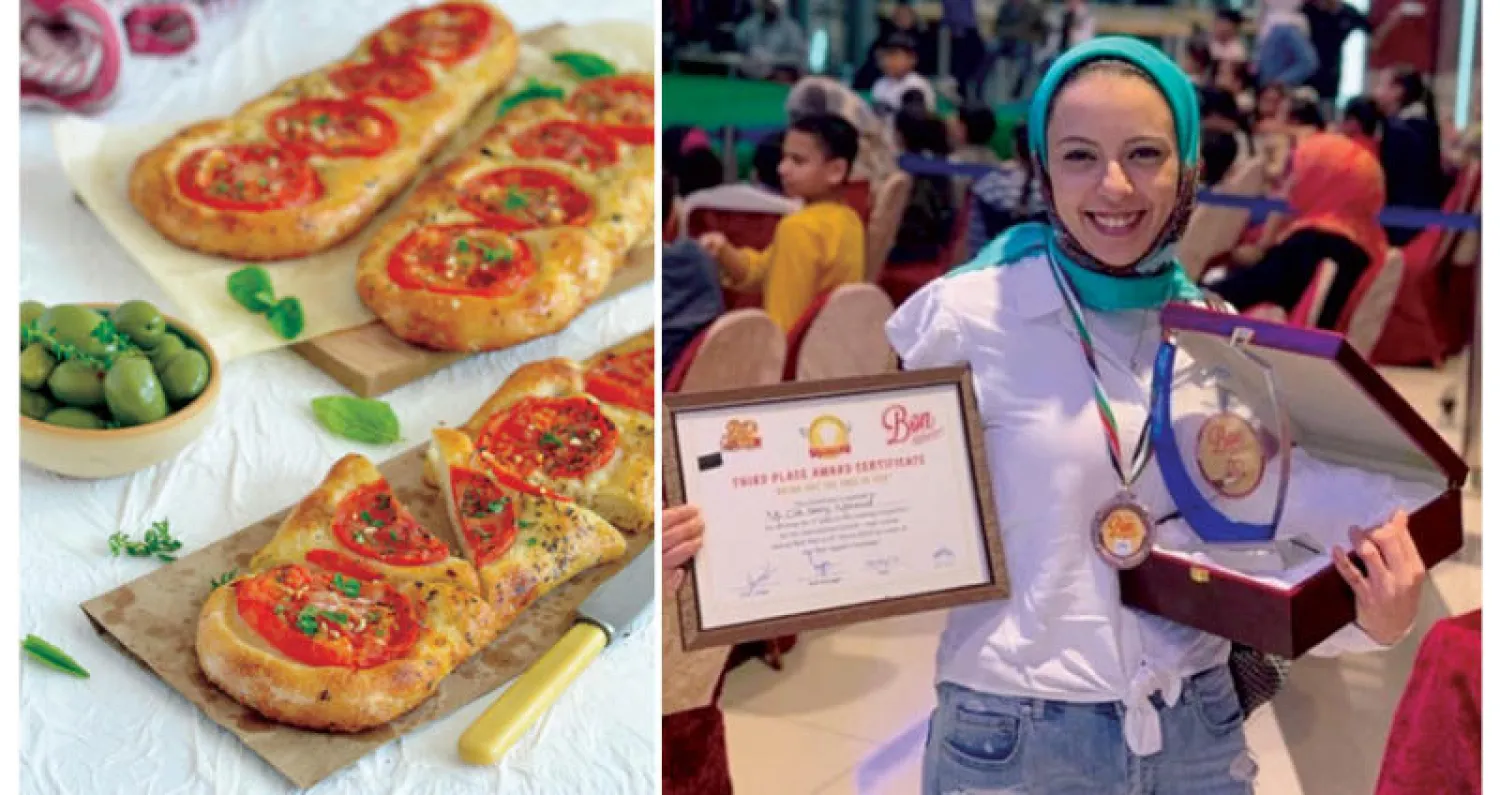 علا حسني مع جائزتها  -  من أصناف المعجنات التي تبدع علا في تحضيرها