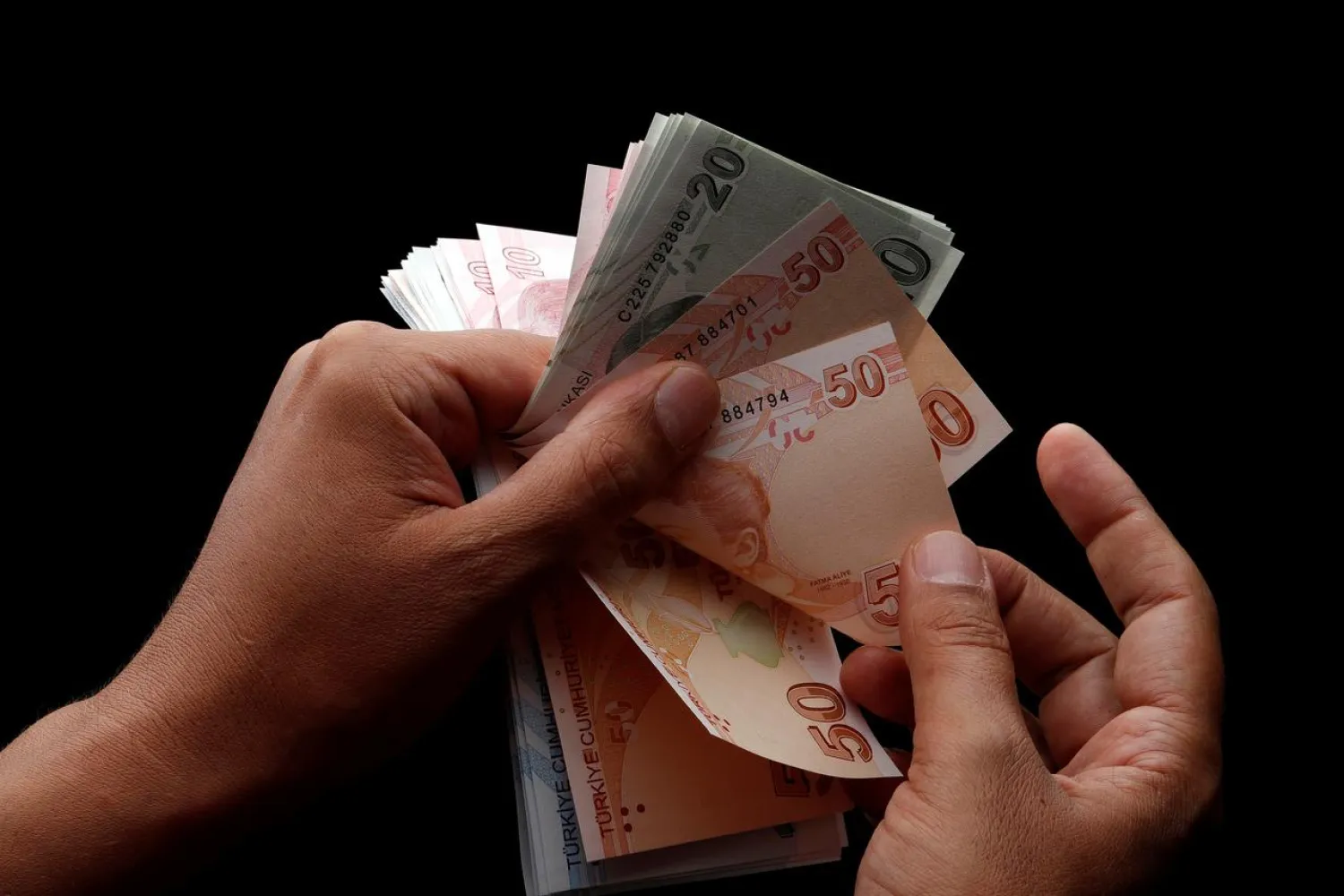 Turkish lira banknotes are seen in this picture illustration in Istanbul, Turkey August 14, 2018. (Reuters)