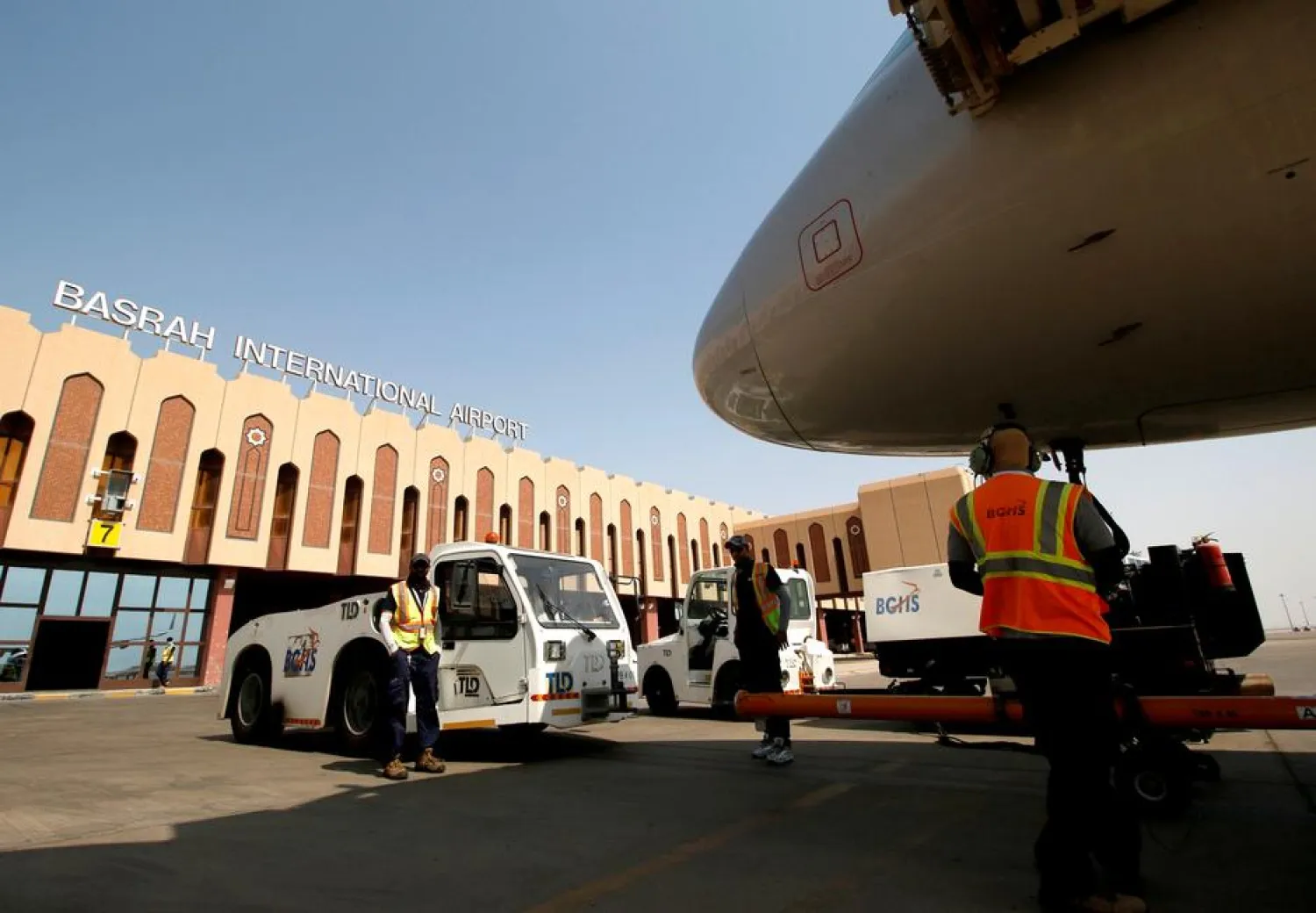 Airport workers are seen at Basra airport after it was targeted by rocket fire in Basra, Iraq September 8, 2018. REUTERS/Essam al-Sudani
