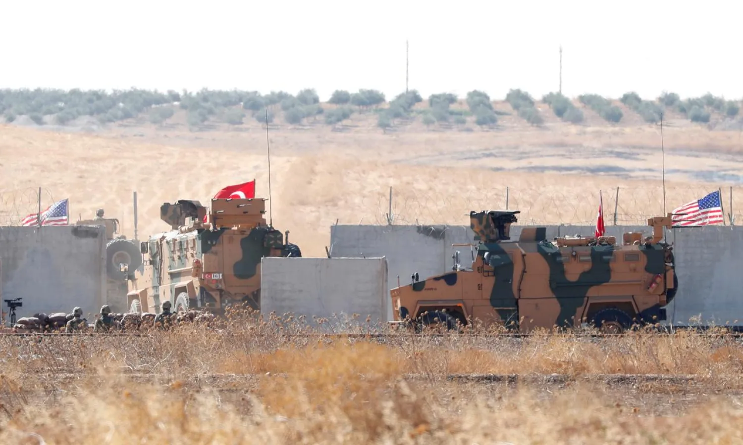 Turkish and US military vehicles seen during a joint patrol in the East Euphrates region, Syria, Reuters
