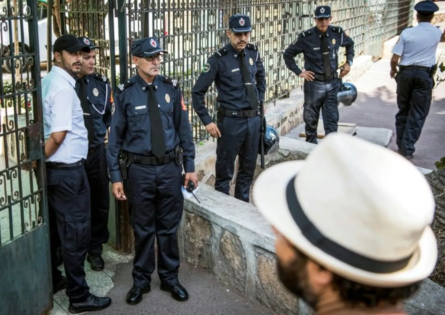 Moroccan security forces stand guard outside a Rabat courthouse where the trial of Hajar Raissouni on September 9, 2019 for alleged abortion | AFP