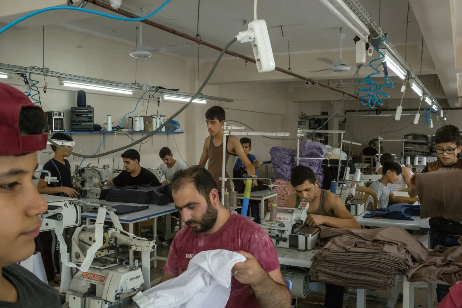A textile factory that hires Syrian refugees in Gaziantep. Credit: Mauricio Lima for The New York Times